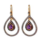 Noble Diva Ametyst øreringe med ametyst ædelsten og diamanter i et mix af 24 kt forgyldt sterlingsølv, samt sort sterlingsølv, for et flot og råt udtryk
Smukke, dråbeformede hoops med single-cut diamanter og en smuk citrin i midten. En meget klædelig f